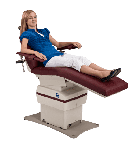 MTI 721 Reclined with floating patient arm and IV arm with patient in chair