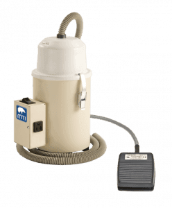 Cream colored MTI DV-3 Dust Vac™ for podaitry and wound care use with foot controls.