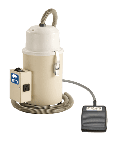 Cream colored MTI DV-3 Dust Vac™ for podaitry and wound care use with foot controls.
