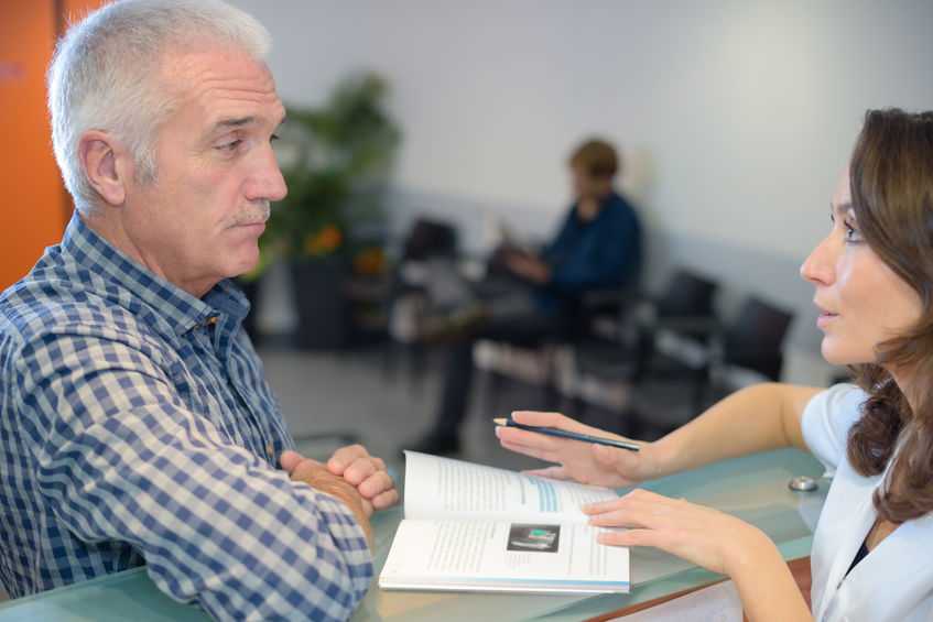 man visiting doctor's office